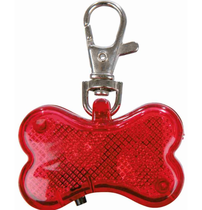 TRIXIE Svítící přívěsek červená kost pro psy 4,5 x 3 cm (RP 2,10 Kč)